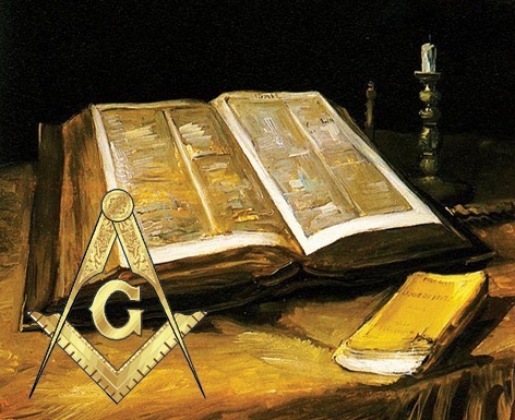 Masonic emblem near an old book